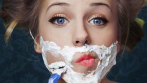 Woman Shaving Face